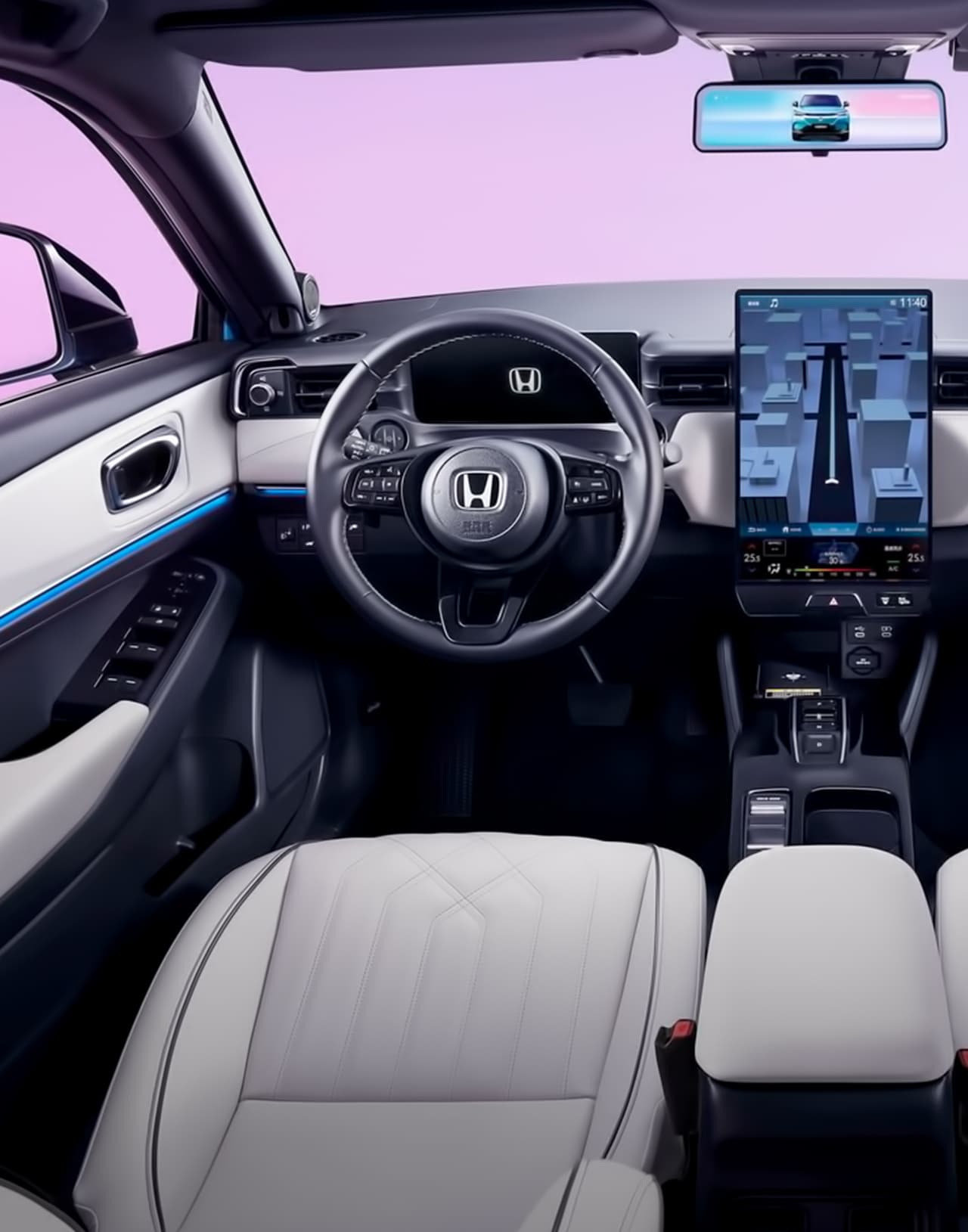 Руль и панель приборов Honda e:Ns1 демонстрирующие современные технологии